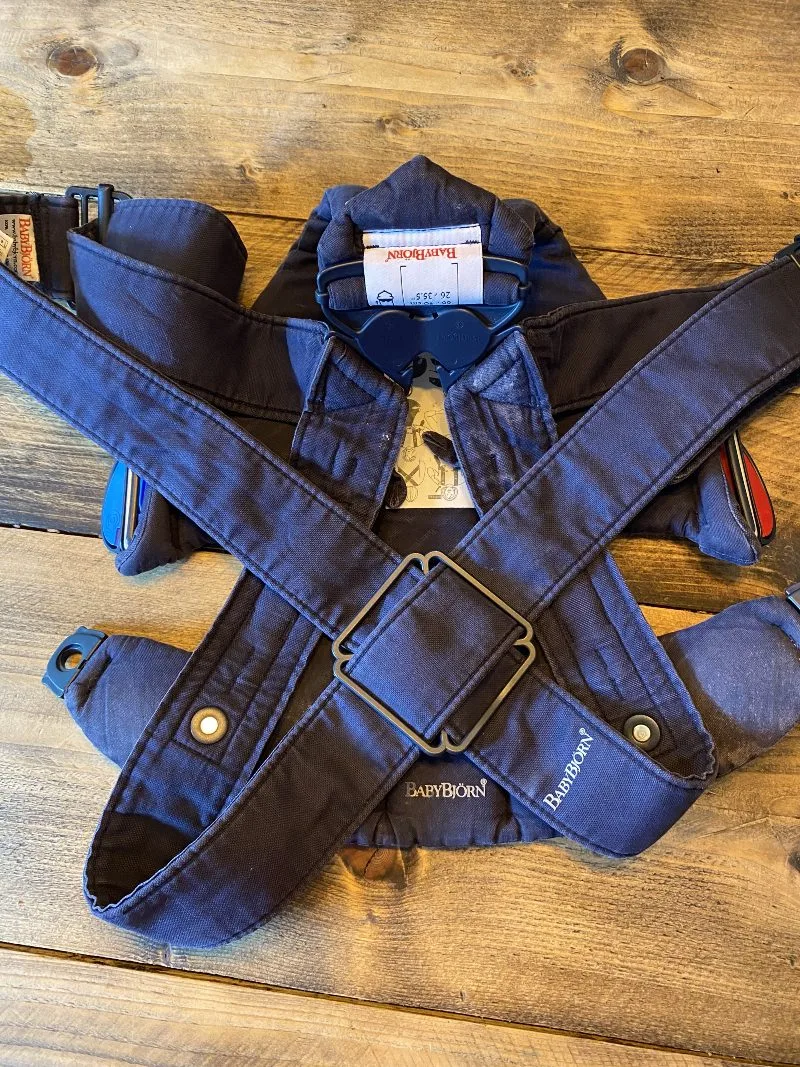 Small, soft and easy to use, this Mini Carrier from BabyBjörn is a great choice for travelling with your precious newborn.

Designed to meet a very young baby’s great need for closeness, the Mini is lightweight and simple to put on and take off, making it perfect for frequent, short baby-wearing sessions. Its clever design means that you can unfasten the entire front section to gently lift out your sleeping baby. You can use it from the day your baby is born — its small size and ability to be folded makes it ideal to pack in your hospital bag - up to the age of approximately 1 year in either facing-in or facing-out positions.